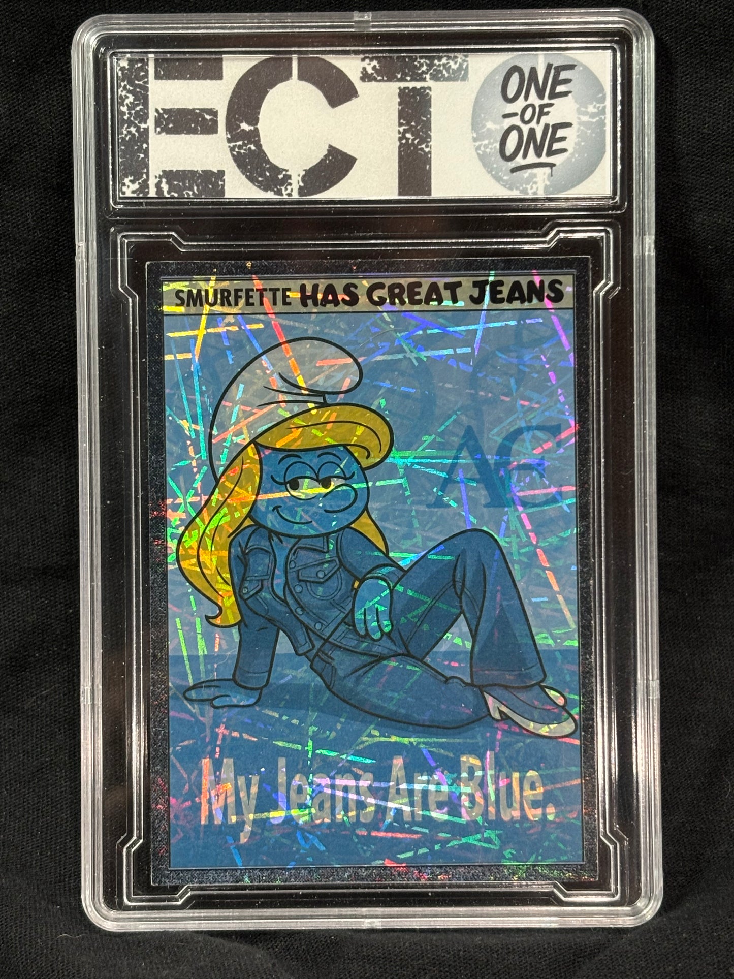 Smurfette – “My Jeans Are Blue” (Lounge Pose) – (Ecto 1/1 Holo Art Card)