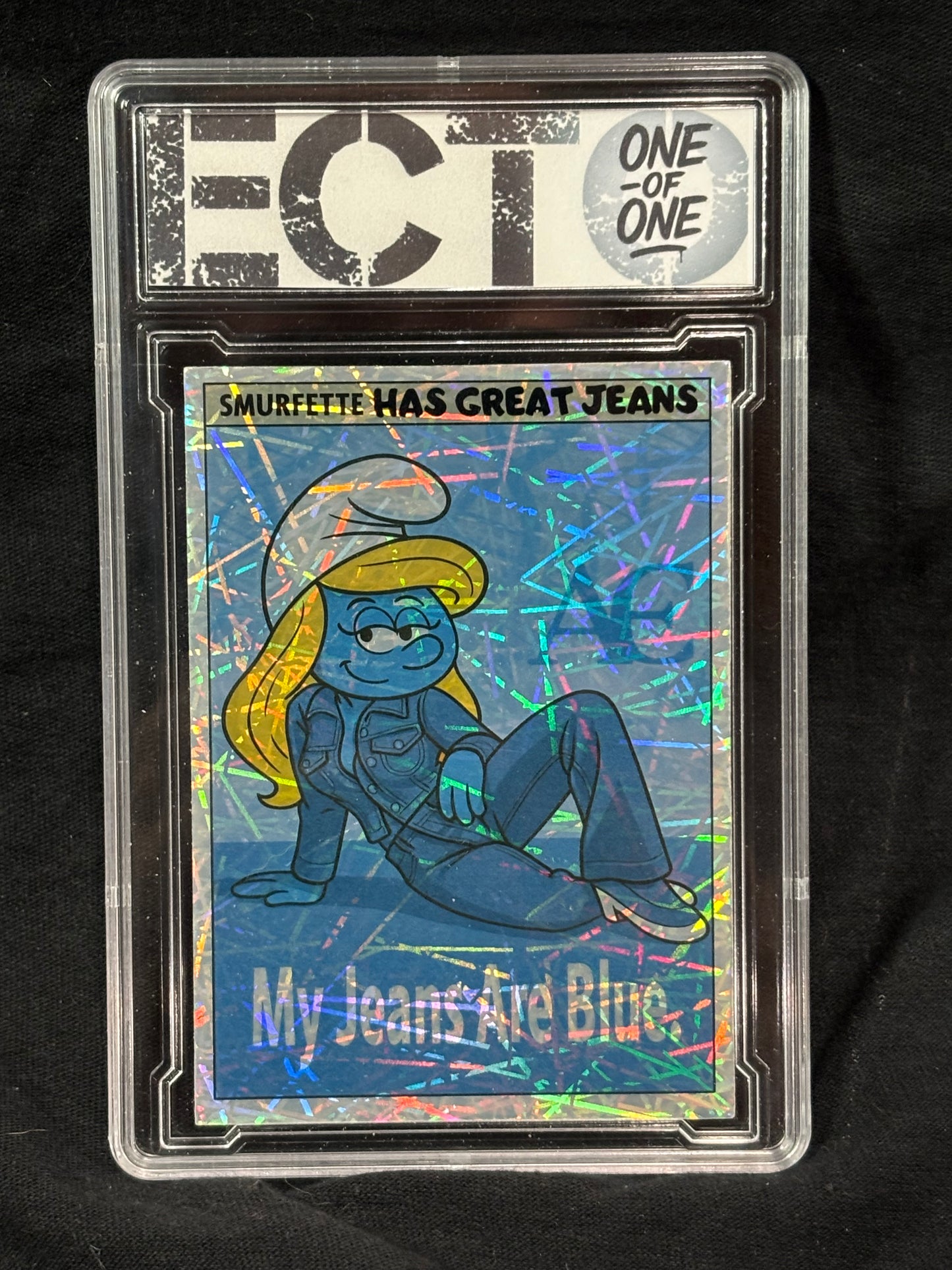 Smurfette – “My Jeans Are Blue” (Lounge Pose) – (Ecto 1/1 Holo Art Card)