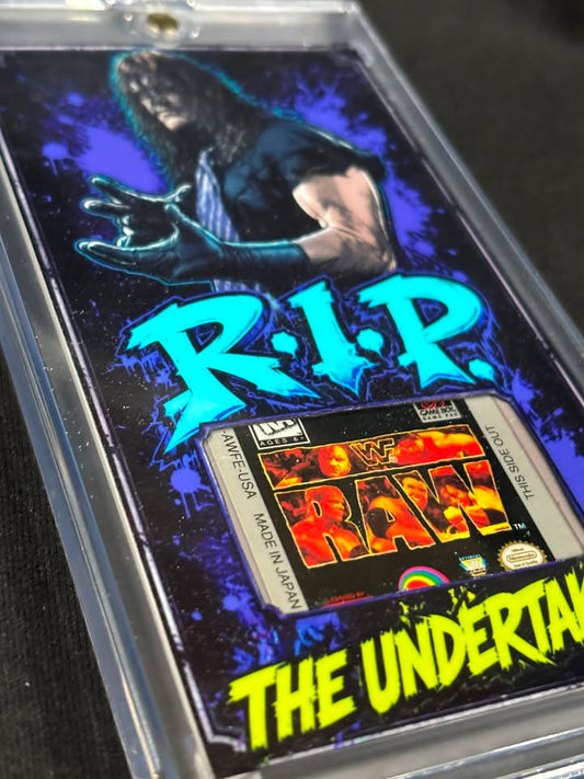 The Undertaker – “R.I.P.” – Authentic WWF RAW Game Boy Relic Card (1/1)