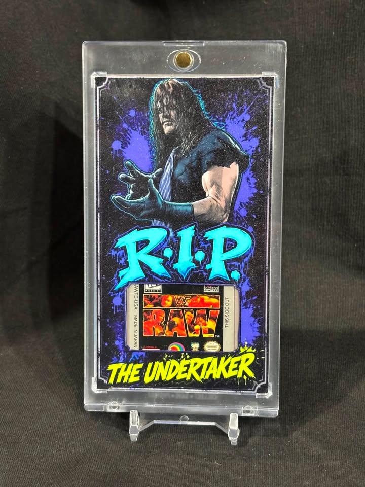 The Undertaker – “R.I.P.” – Authentic WWF RAW Game Boy Relic Card (1/1)