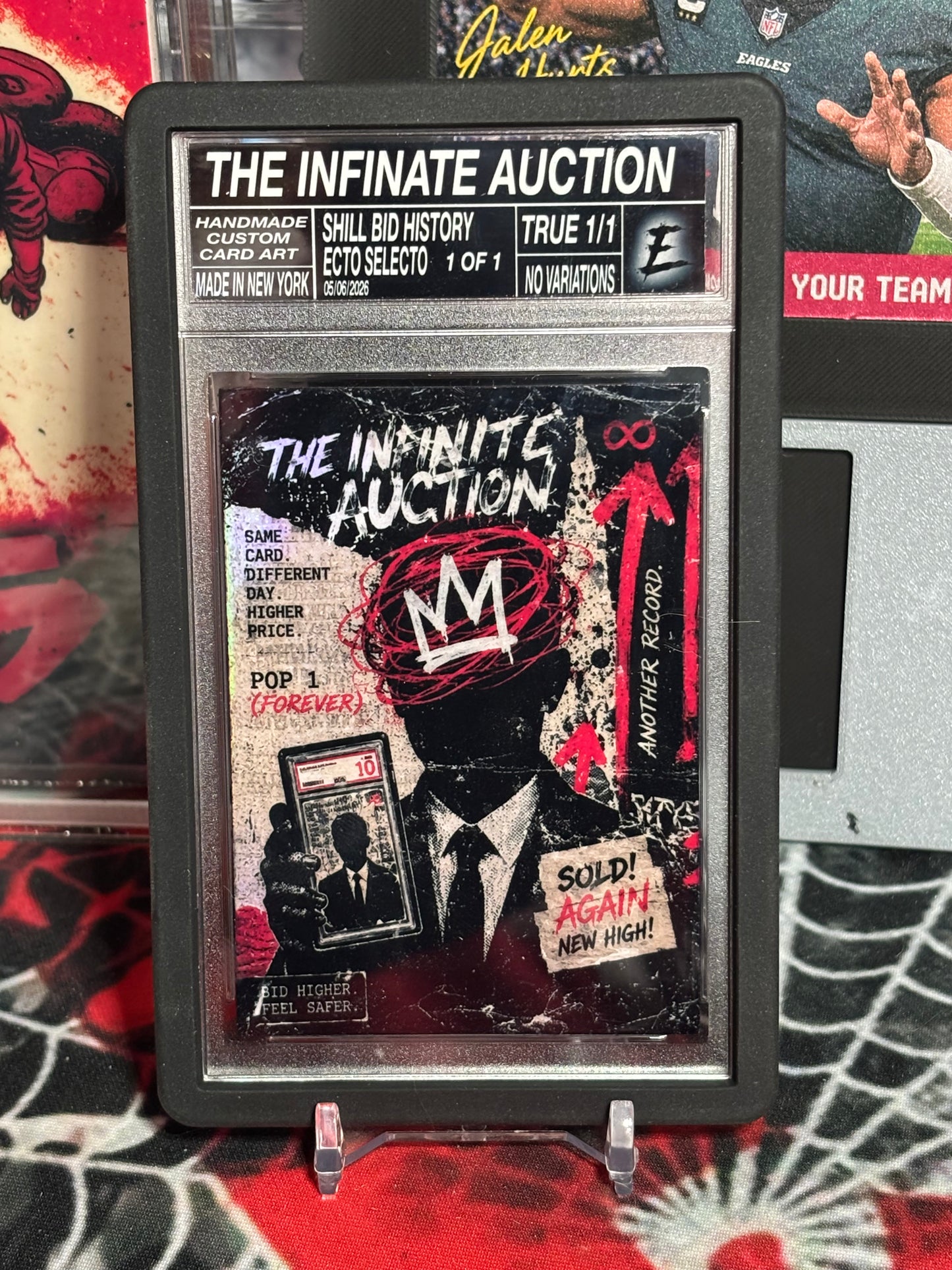 The Infinite Auction – “Shill Bid History” – (Ecto Selecto 1/1 Custom Slab Art Card)